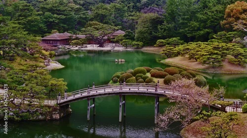 Japanese garden pond and bridge Ritsurin park at kagawa pref Japan. photo