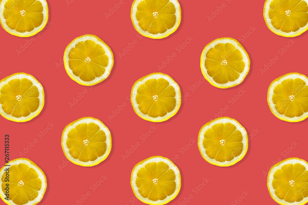 Creative pattern made of lemon. top view of fruit fresh limes slices on colorful background.