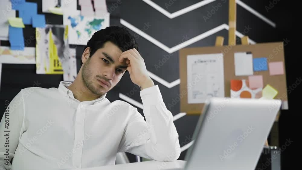 Businessman having a hard day. Man rests after difficult negotiations Businessman having a hard day. Man rests after difficult negotiations