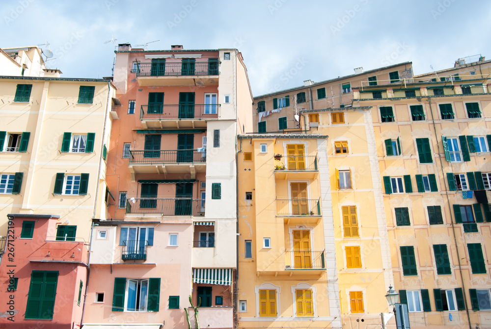 Some colorful houses seen from the beach of Camogli