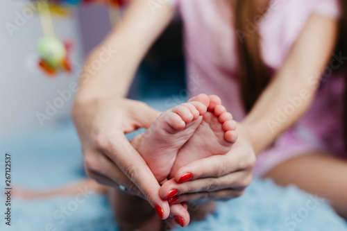 Closeup photo of a little boy's feet.