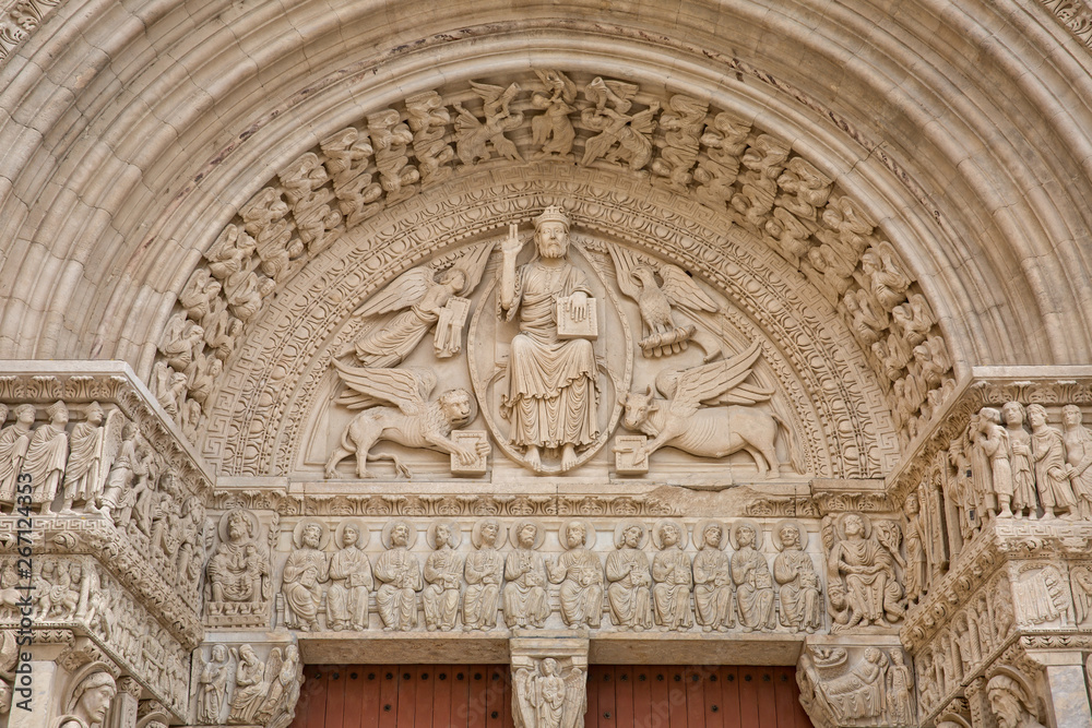 Beautiful architecture of entrance door of Church of Saint Trophime. Tympanum On Church Of St. Trophime in Arles, Provence, Bouches-du-Rhône, France