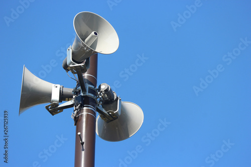 security speakers tower for warning or announce with clear blue sky background