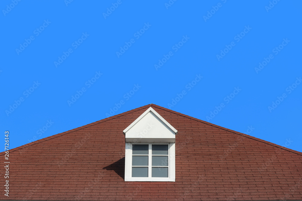 modern gable roof design house wall with clear blue sky background. modern gable roof design house wall with clear blue sky background.