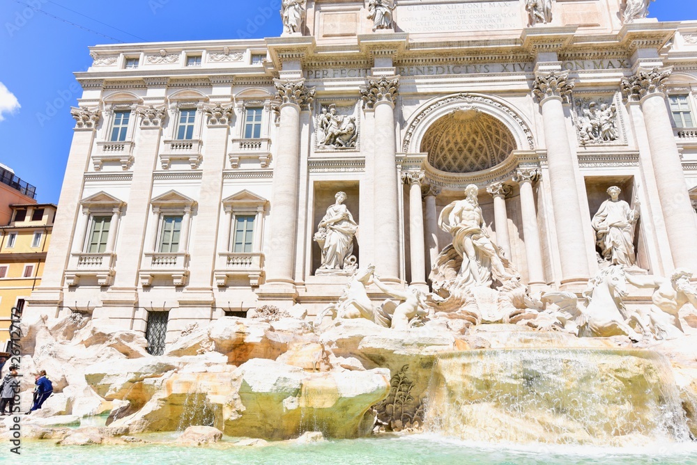 Trevi Fountain with Triumphal Arch and Neptune in Rome City