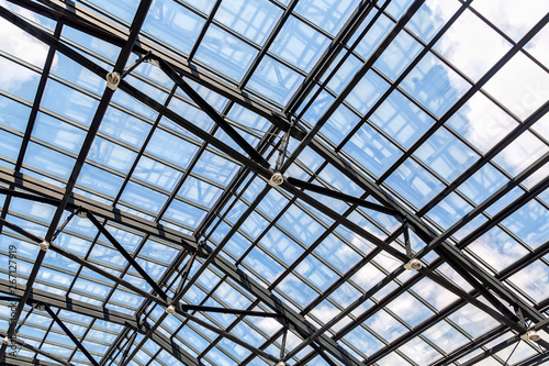 Openwork steel and glass ceiling