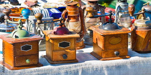 Old italian wooden Coffee grinder exhibited in a street flea market
