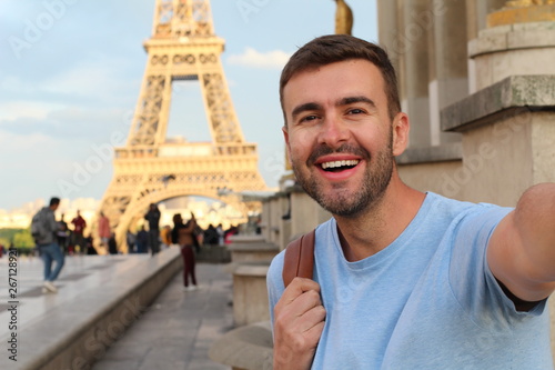 Photography Man taking a selfie in the Eiffel Tower, Paris