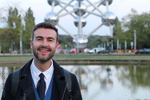 Wallpaper Mural Handsome European businessman smiling outdoors  Torontodigital.ca