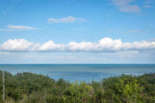 Looking out to sea from a hillside near Eastbourne in Sussex, on a sunny spring day © lemanieh
