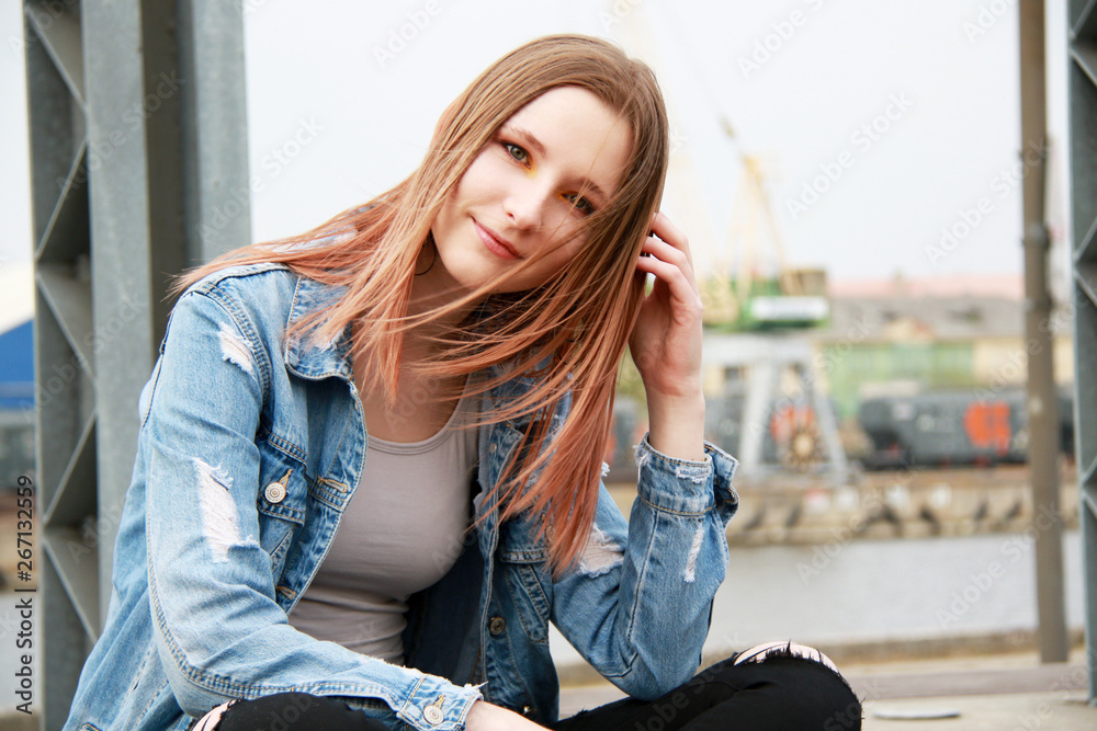 Urban style portrait of young caucasian woman