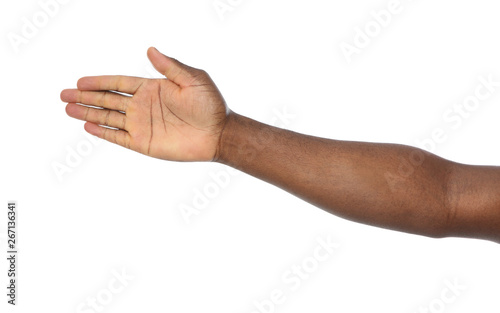 African-American man extending hand for shake on white background, closeup
