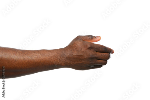 Tableau sur toile African-American man extending hand for shake on white background, closeup