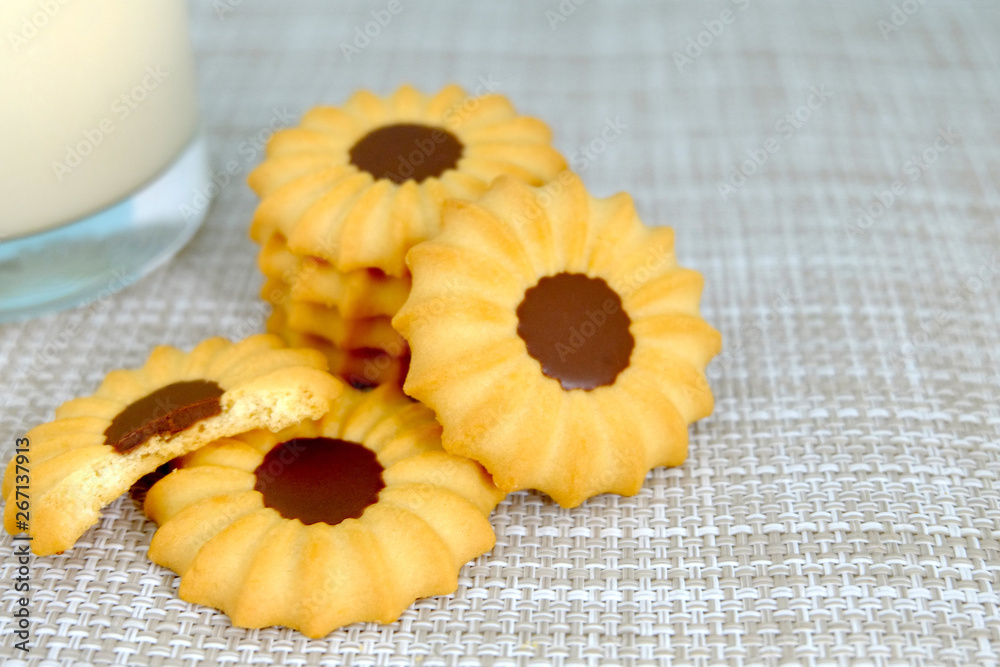 Group of round cookies, Chocolate cookies and cinnamon, Bakery on table Group of round cookies, Chocolate cookies and cinnamon, Bakery on table