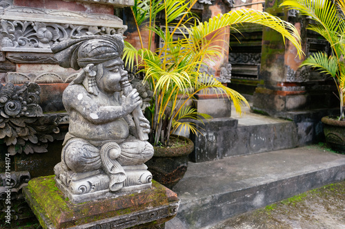 Balinese statue near home entrance (gates) in Ubud, Bali. Detailed portrait.