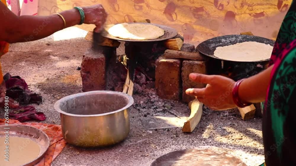 Non Veg Cooking And Baking White Sorghum In Indian Tradition Way - multiple clips