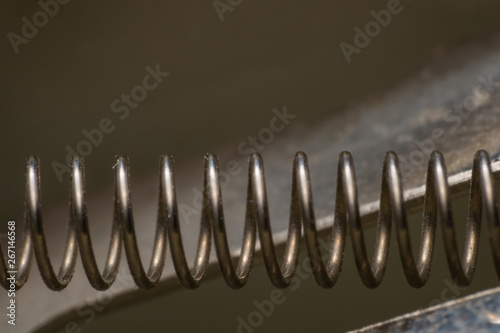 stapler spring close-up and blurred background