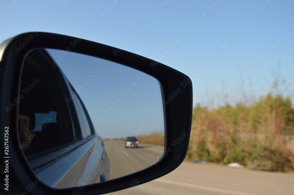 Car in the mirror
