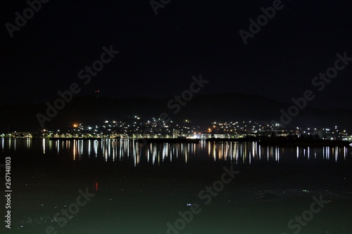 City lights reflection in the water - Danube river - Orsova. 