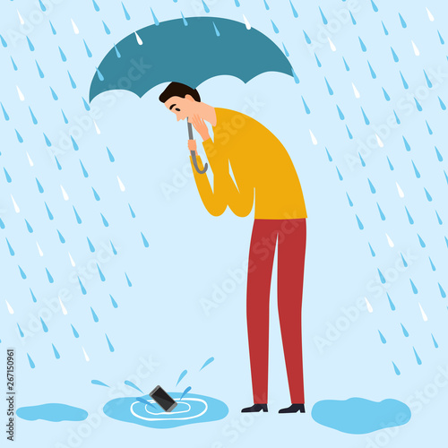 Man drop his mobile phone into a puddle.