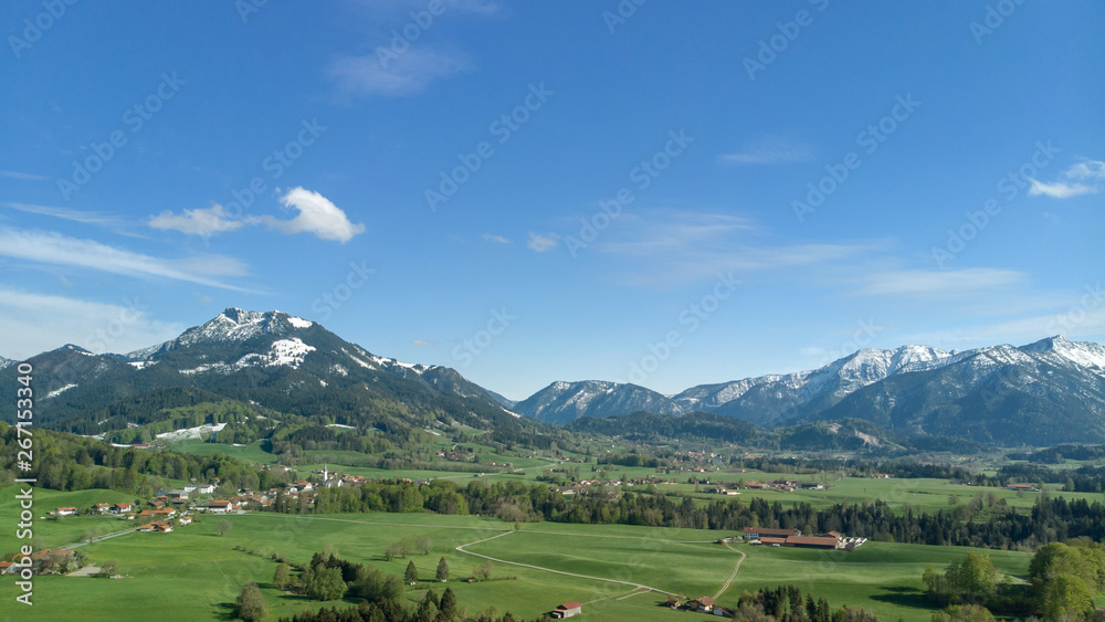 Panormic view of beautiful landscape in Bavaria with alp mountains and blue sky