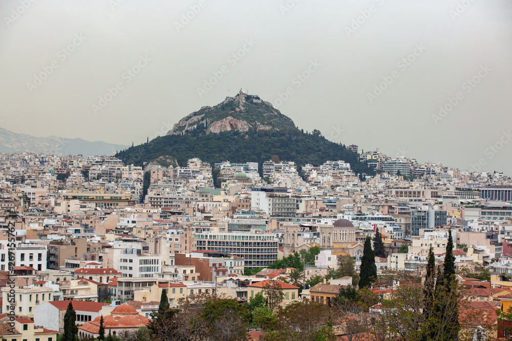 View from Acropolis on cityscape of Athens and Lycabettus Hill, known as Lykabettos