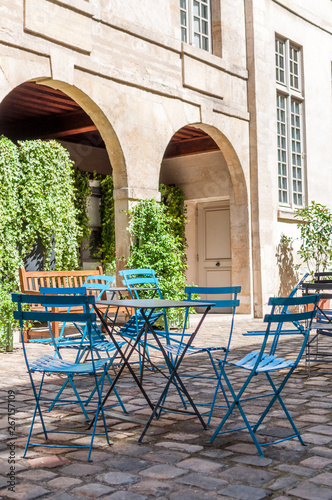 Parisian cafe terrace in the cobbled streets of old Paris - Paris  France