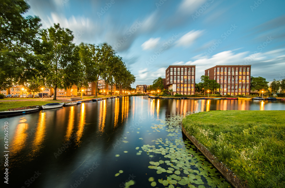 Long exposure of a canal in Amsterdam, the Netherlands