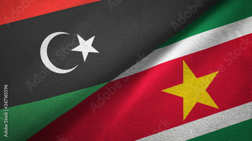 Libya and Suriname two flags textile cloth, fabric texture