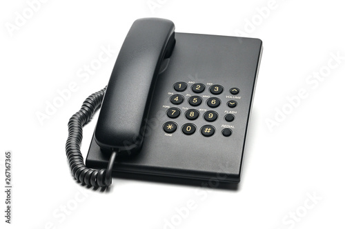 Classic wired telephone on a white background