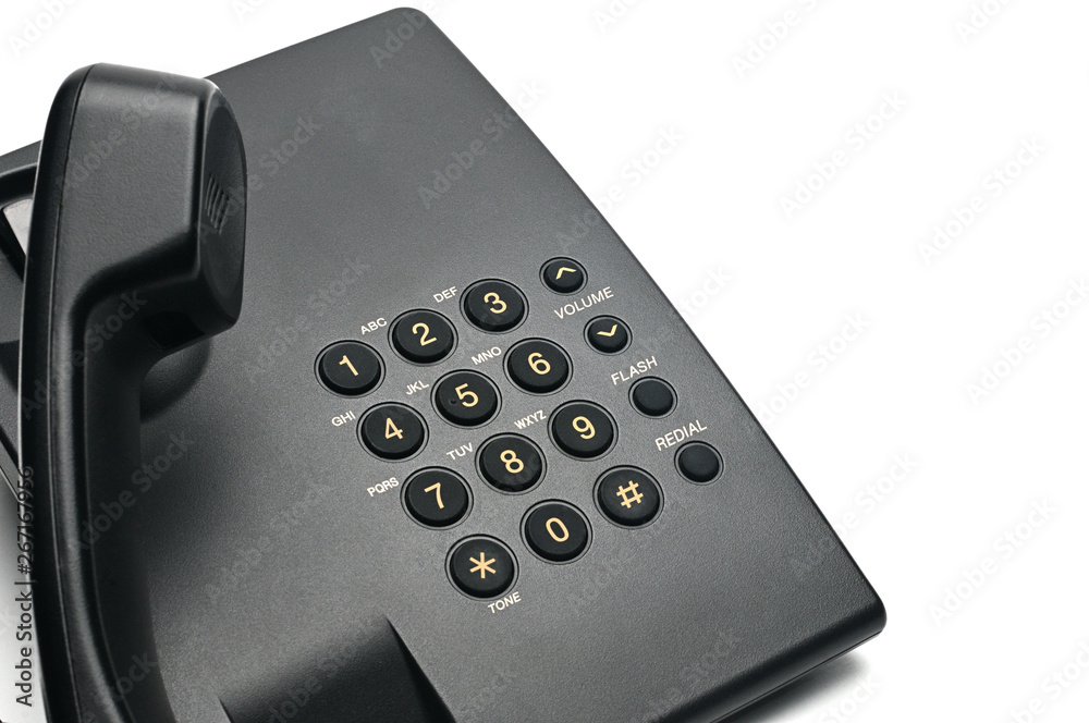 Classic wired telephone on a white background.Lifted handset phone Classic wired telephone on a white background.Lifted handset phone