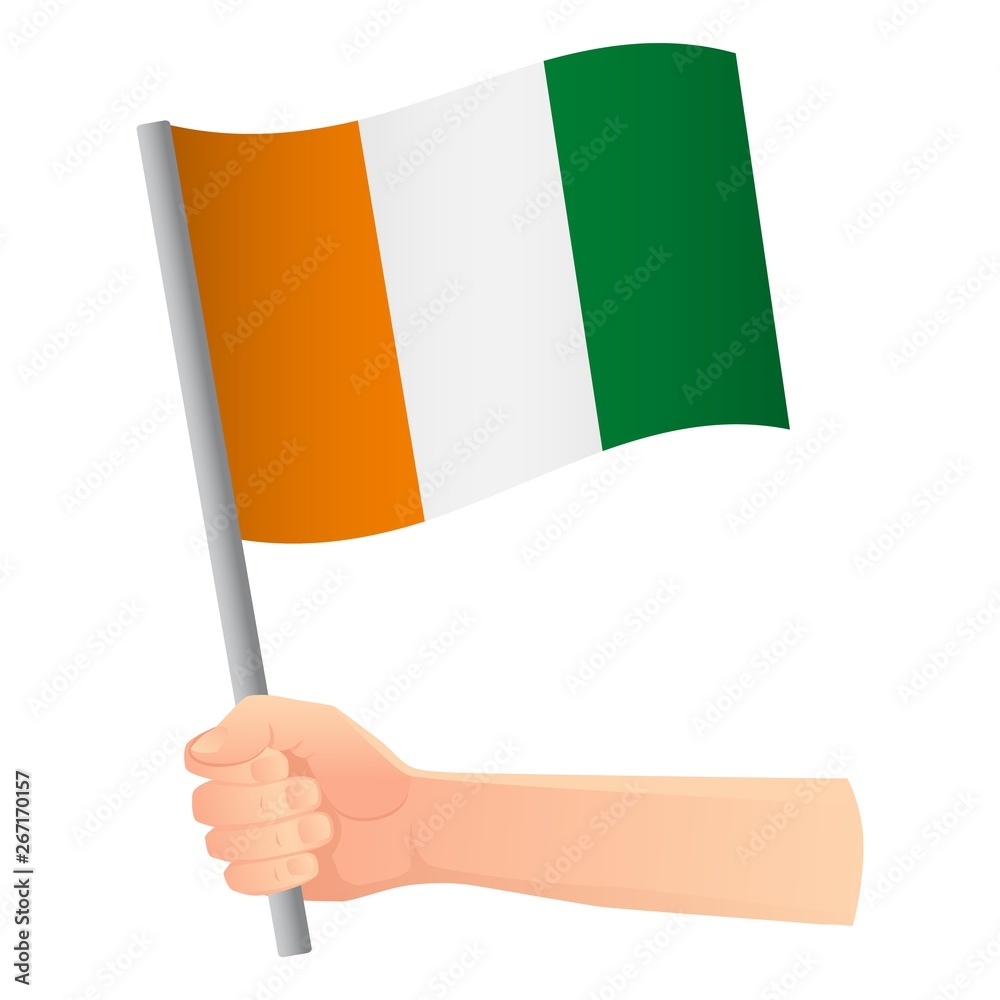 cote d'ivoire - Ivory Coast flag in hand cote d'ivoire - Ivory Coast flag in hand