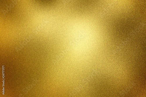 Brushed glossy golden metal, abstract texture background
