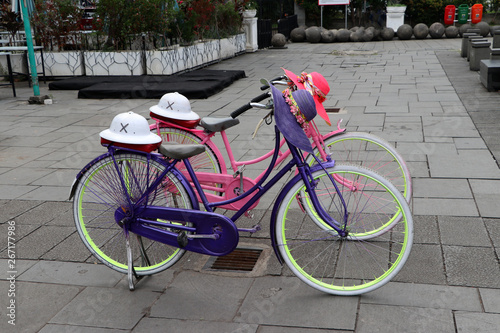 Colorful bicycles lined up for rent on Fatahilah Square at old town in Jakarta. photo