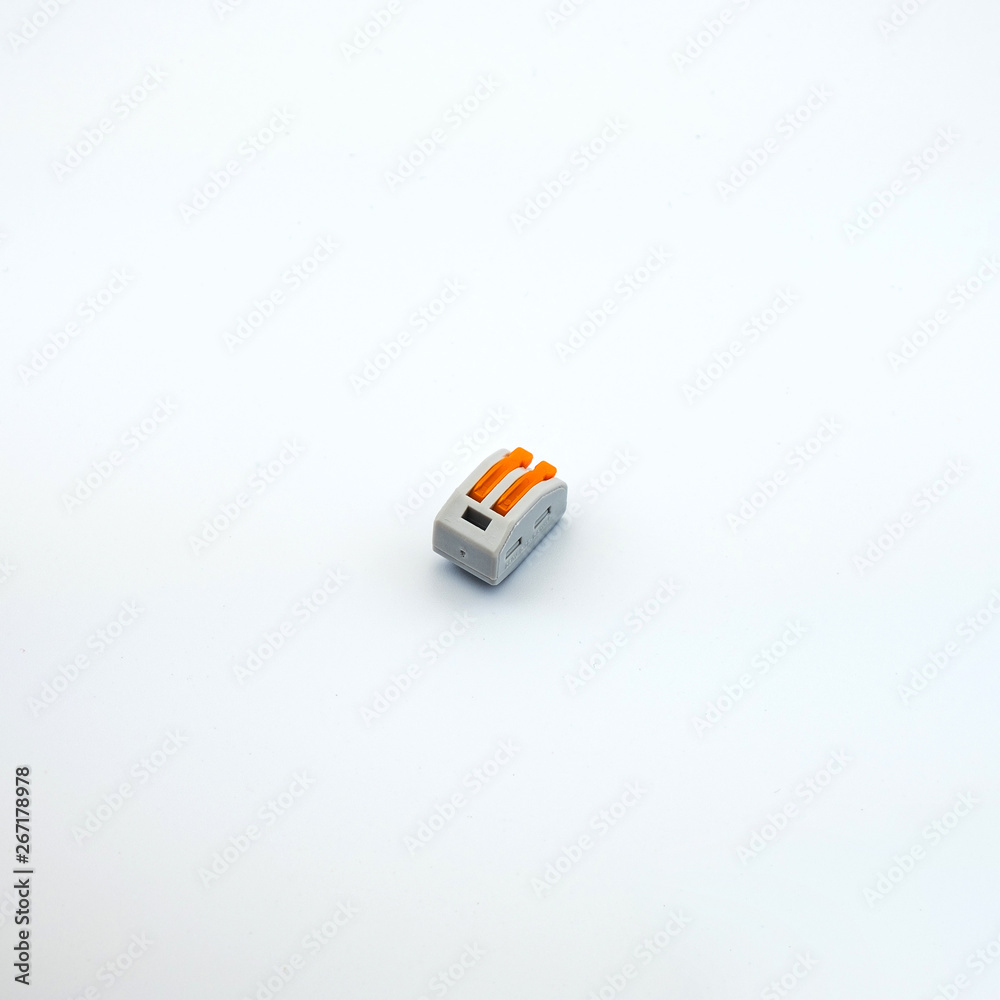Concept photo of an electrical device in electrical wiring for connecting wires on a white background. Great for the catalog of a modern online store. Concept photo of an electrical device in electrical wiring for connecting wires on a white background. Great for the catalog of a modern online store.