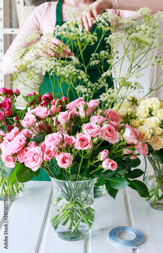 Florist working with roses.