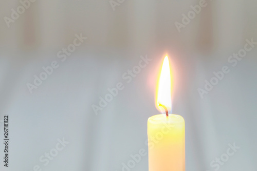 Yellow single candle photo