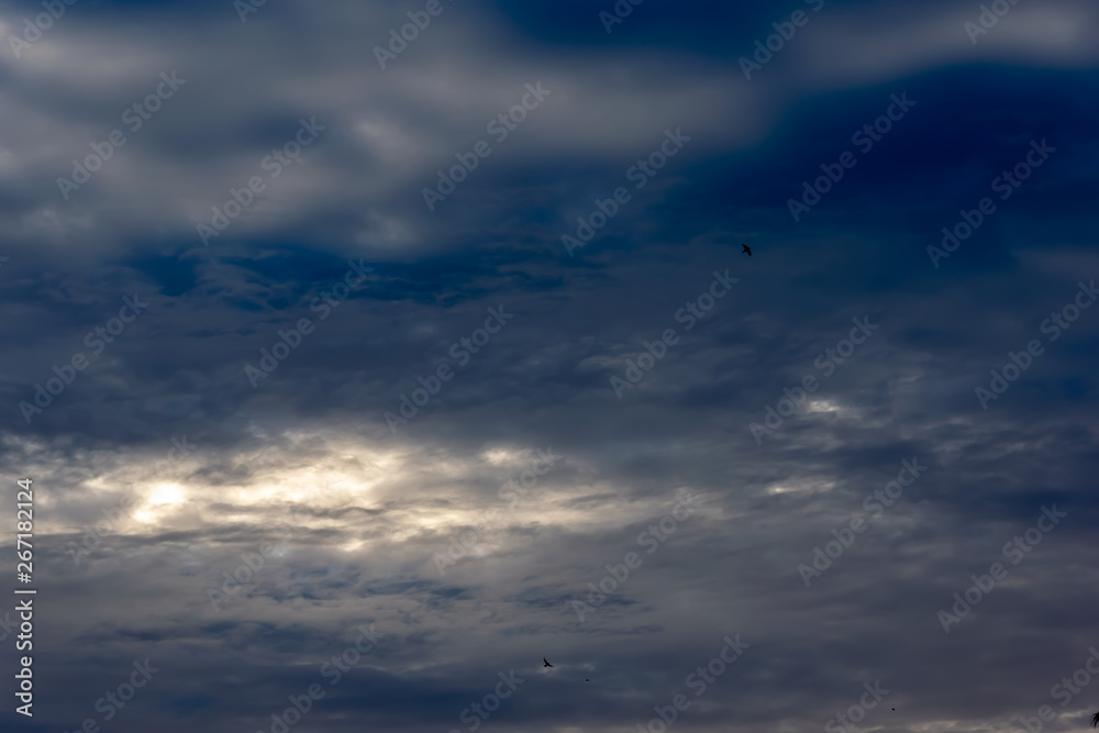 Blue sky with clouds in sunny day.