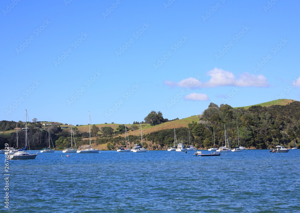 beach landscape, blue sky and boats