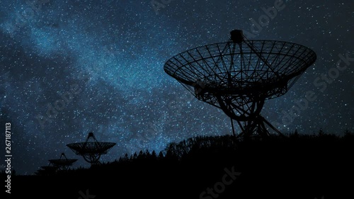 Westerbork Synthesis Radio Telescope (WSRT) by Night with Stars, Milky Way and Radars in Silhouette, Netherlands photo