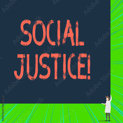 Writing note showing Social Justice. Business concept for Equal access to wealth and privileges within a society photo