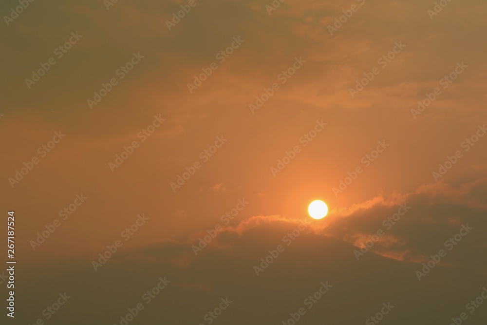 Sunrise in summer time with the clouds and orange sky. Nature background concept. Sunrise in summer time with the clouds and orange sky. Nature background concept.