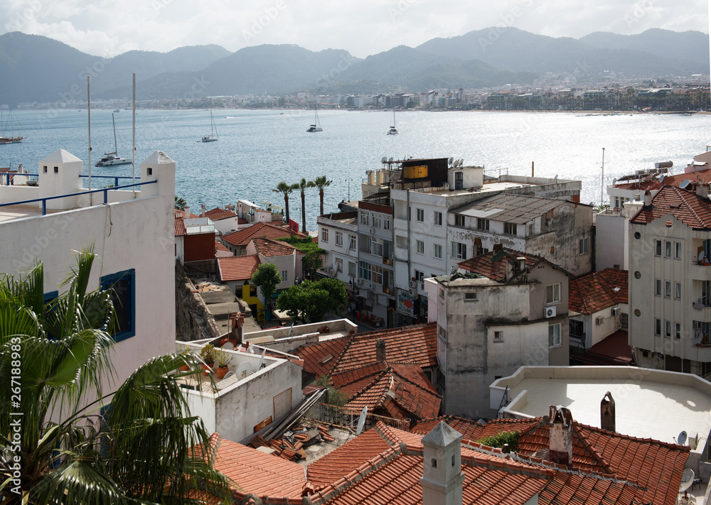 Panorama of the ancient Marmaris, Turkey. View of the roofs, sea and mountains