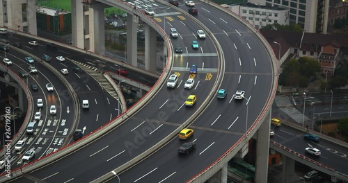car traffic moving on multi row Spiral Nanpu bridge in the evening, Shanghai