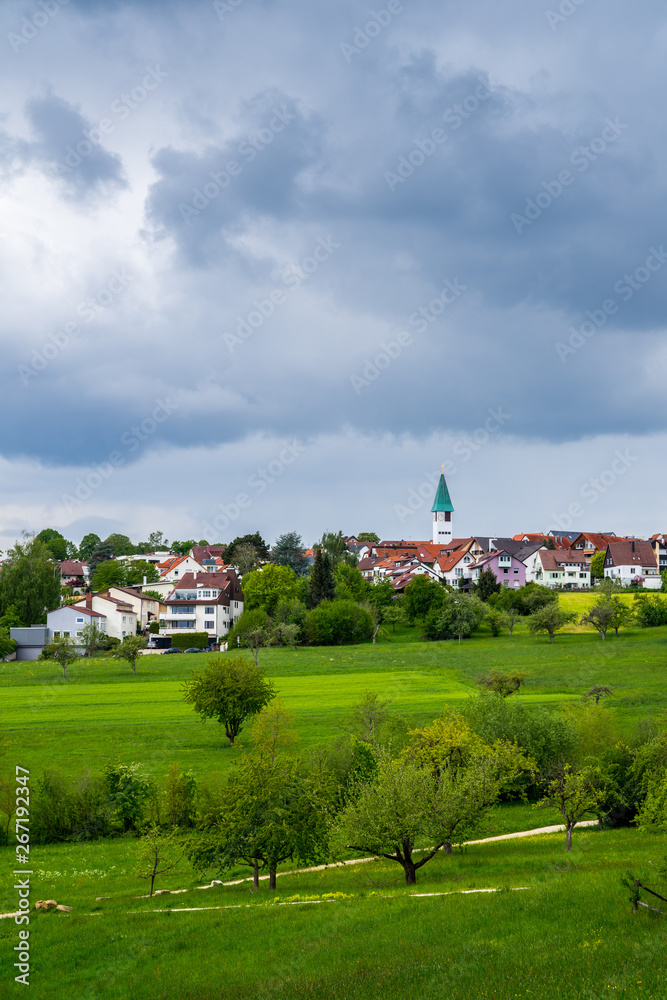 Germany, Ostfildern urban district kemnat village houses behind green landscape