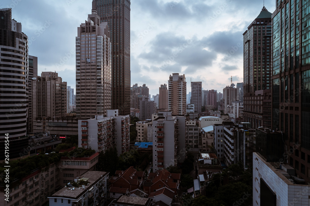 Obraz premium Aerial view of business area and cityscape in the dawn, West Nanjing Road, Jing` an district, Shanghai