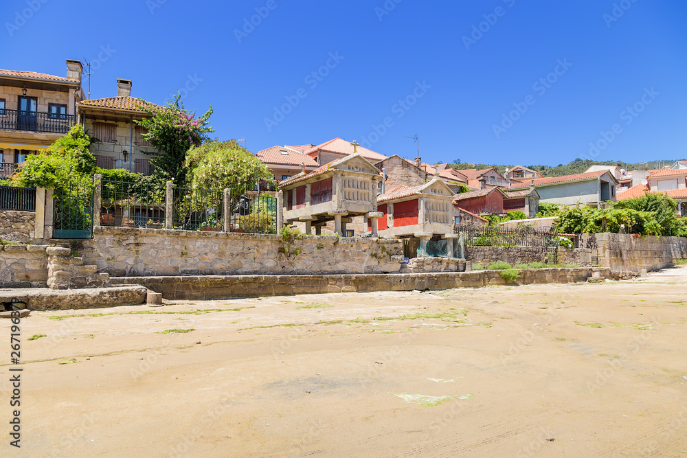 Combarro, Spain. Embankment of the old town with traditional horreo granaries