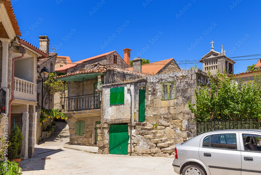 Fototapeta premium Combarro, Spain. Scenic view of the old town with a traditional horreo barn
