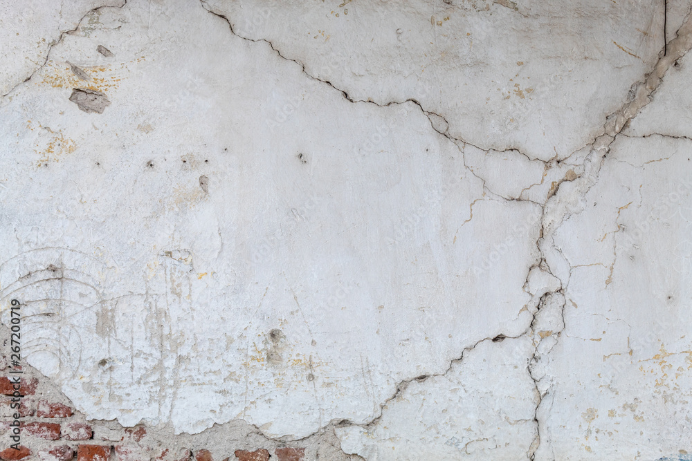 Old Weathered White Painted Cracked Wall Texture 