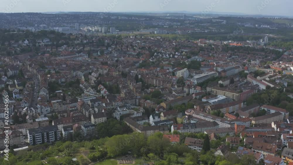 Aerial around the Gaisburg hill in spring in Stuttgart, Germany. Pan to the right with a wide view of Stuttgart. Aerial around the Gaisburg hill in spring in Stuttgart, Germany. Pan to the right with a wide view of Stuttgart.